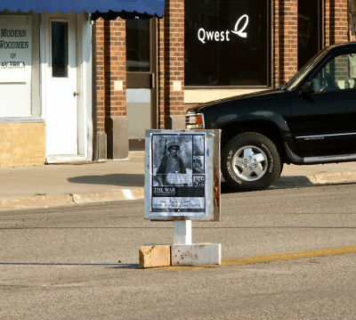 Event poster strategically placed in the busiest intersection of downtown Miller.